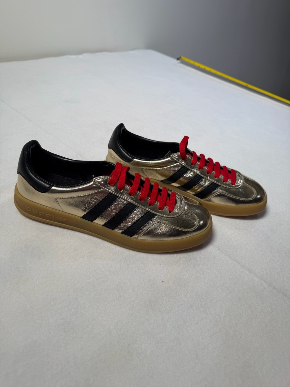 Gucci Metallic Gold Sneakers with Black Stripes and Red Laces - Picture 2 of 8